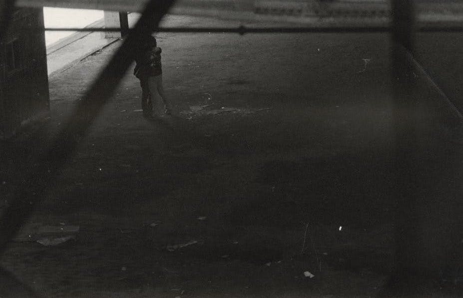 Alvin Baltrop, "Two Figures Embracing in Warehouse," New York, c. 1980