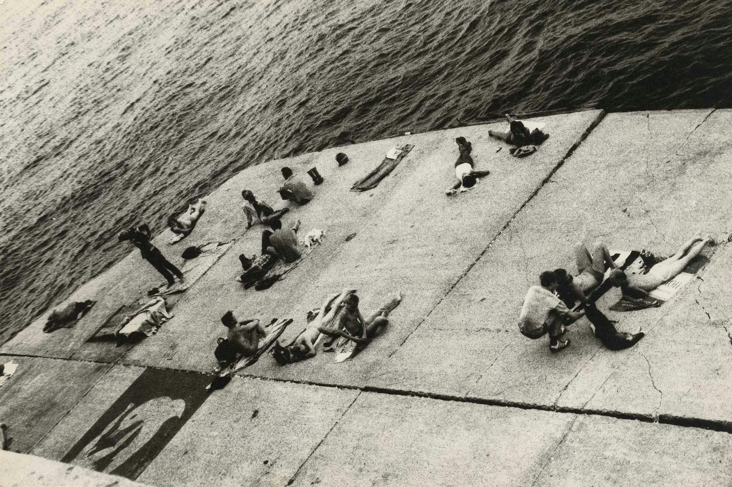 Alvin Baltrop, "Sunbathing Platform with Tava Mural," West Side Piers, New York, c. 1980