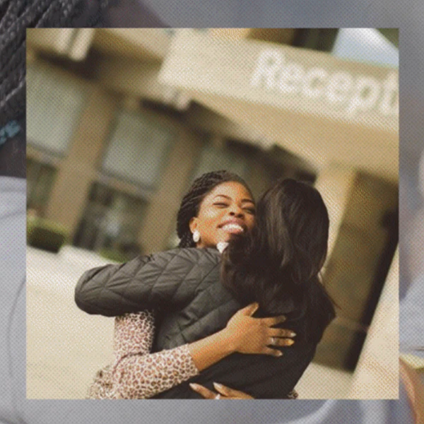 Two students hugging in Essex's campaign