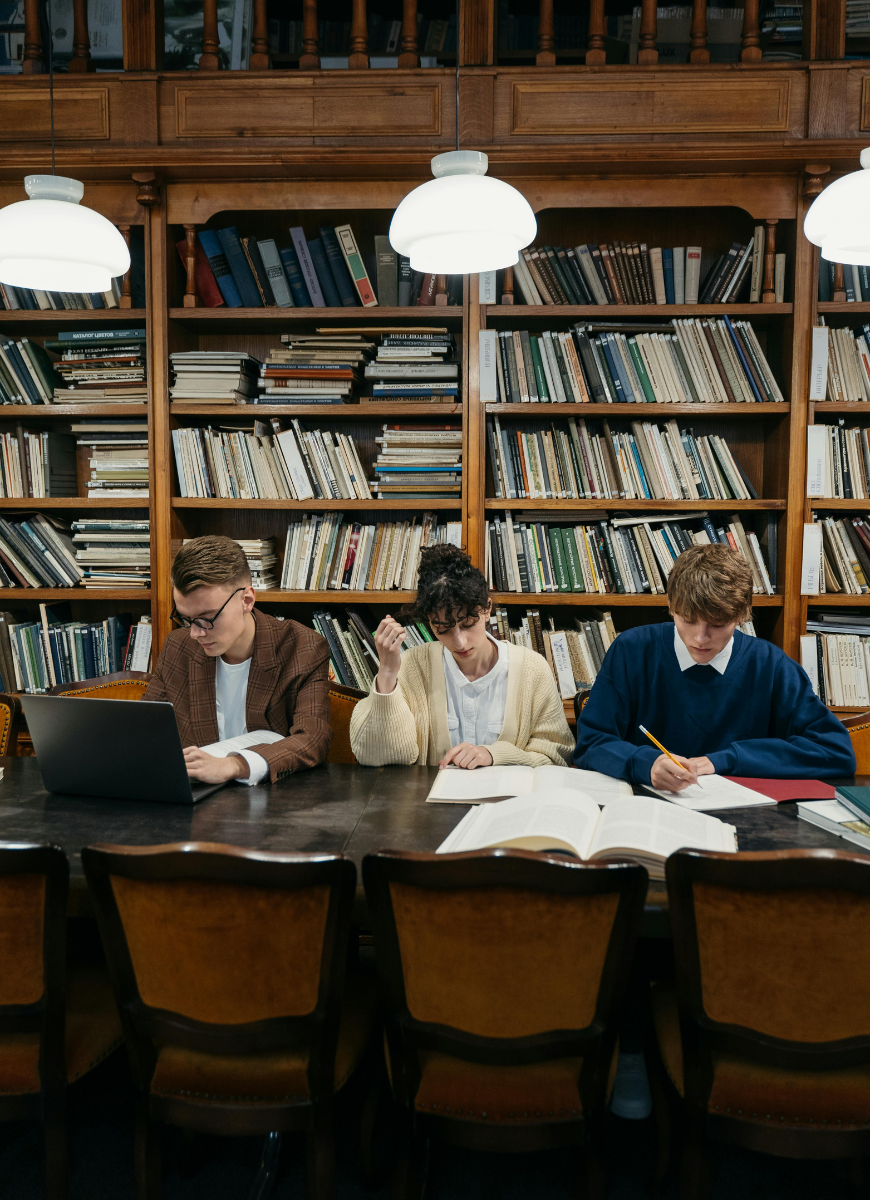 3 students studying 