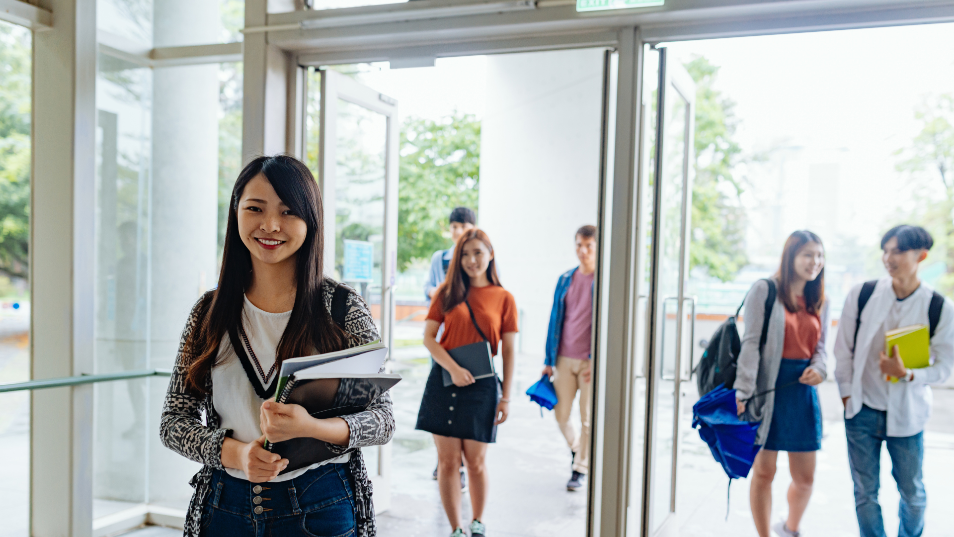 students through doors