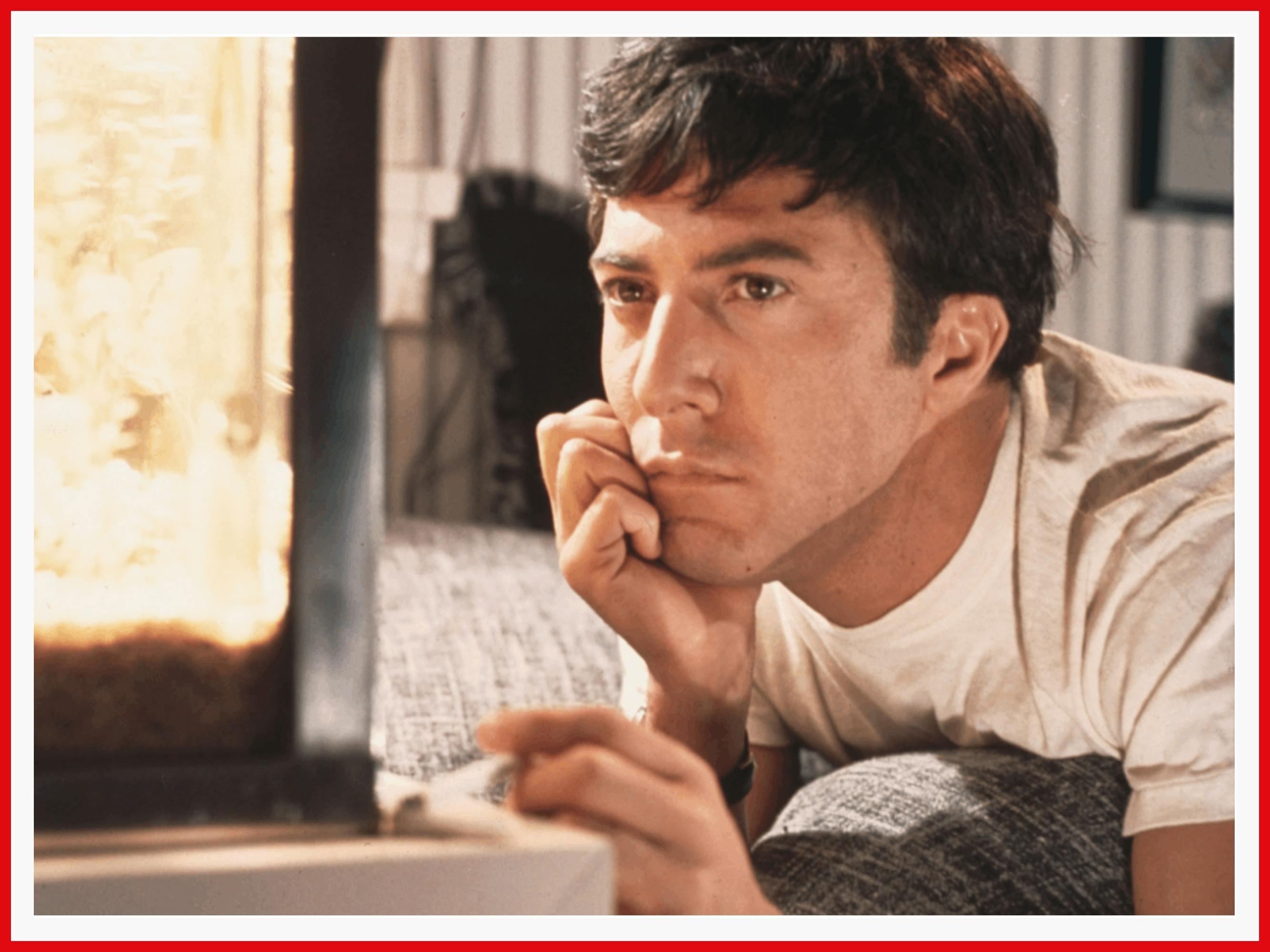 Hoffman as Ben Braddock, pondering his fish tank and looking disillusioned.