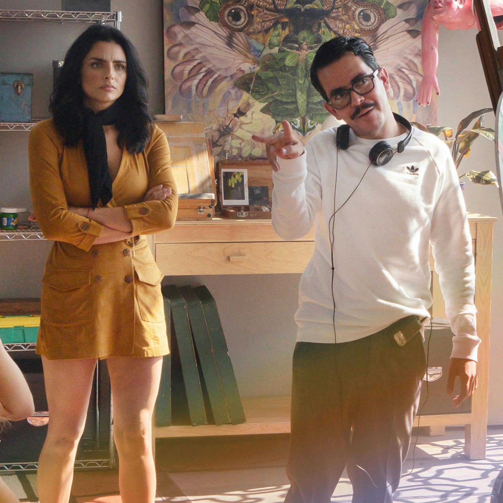 Aislinn Derbez with Manolo Caro on set