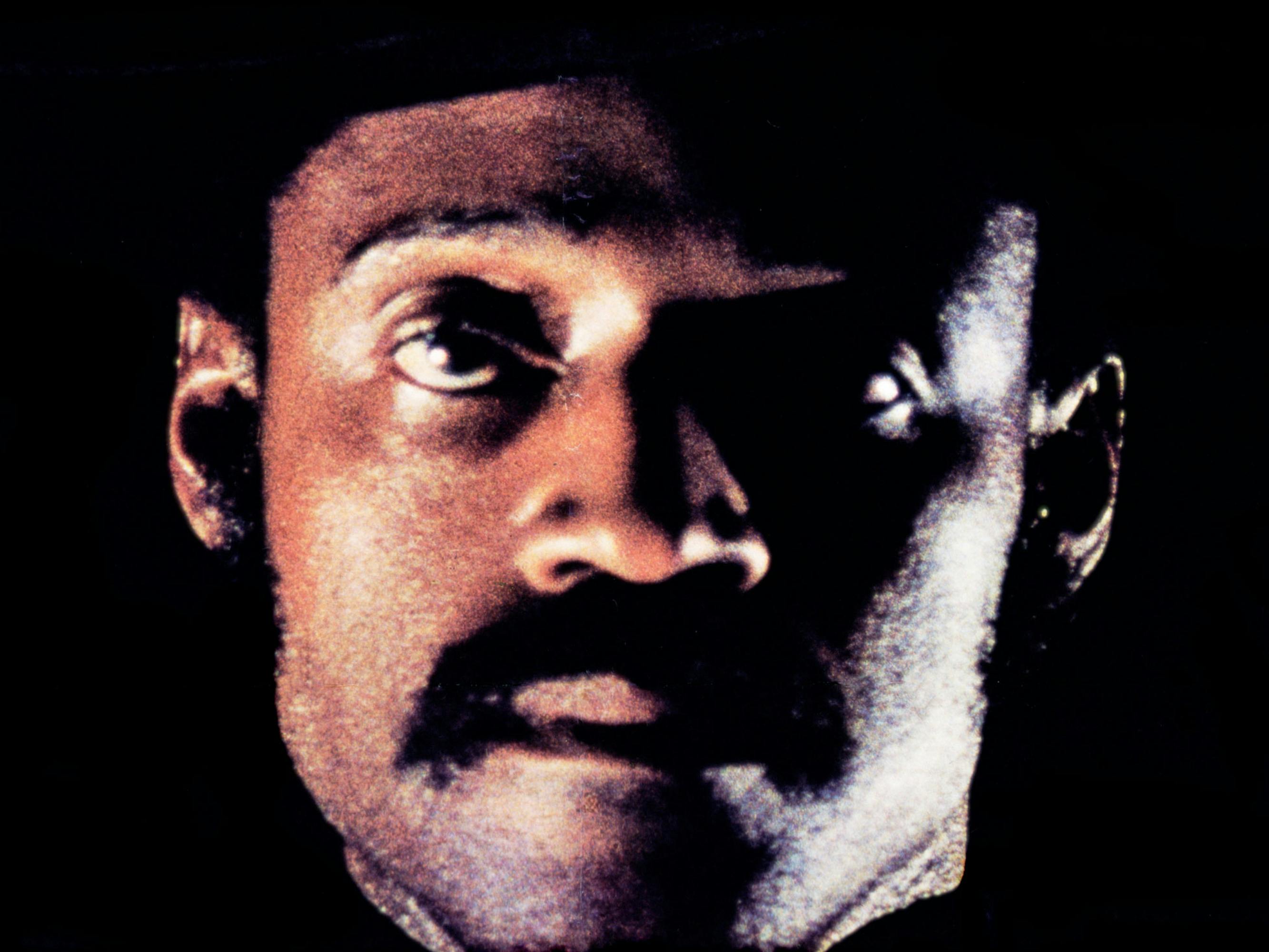 Sweetback (Melvin Van Peebles) sports an impressive mustache in the close cropped picture.