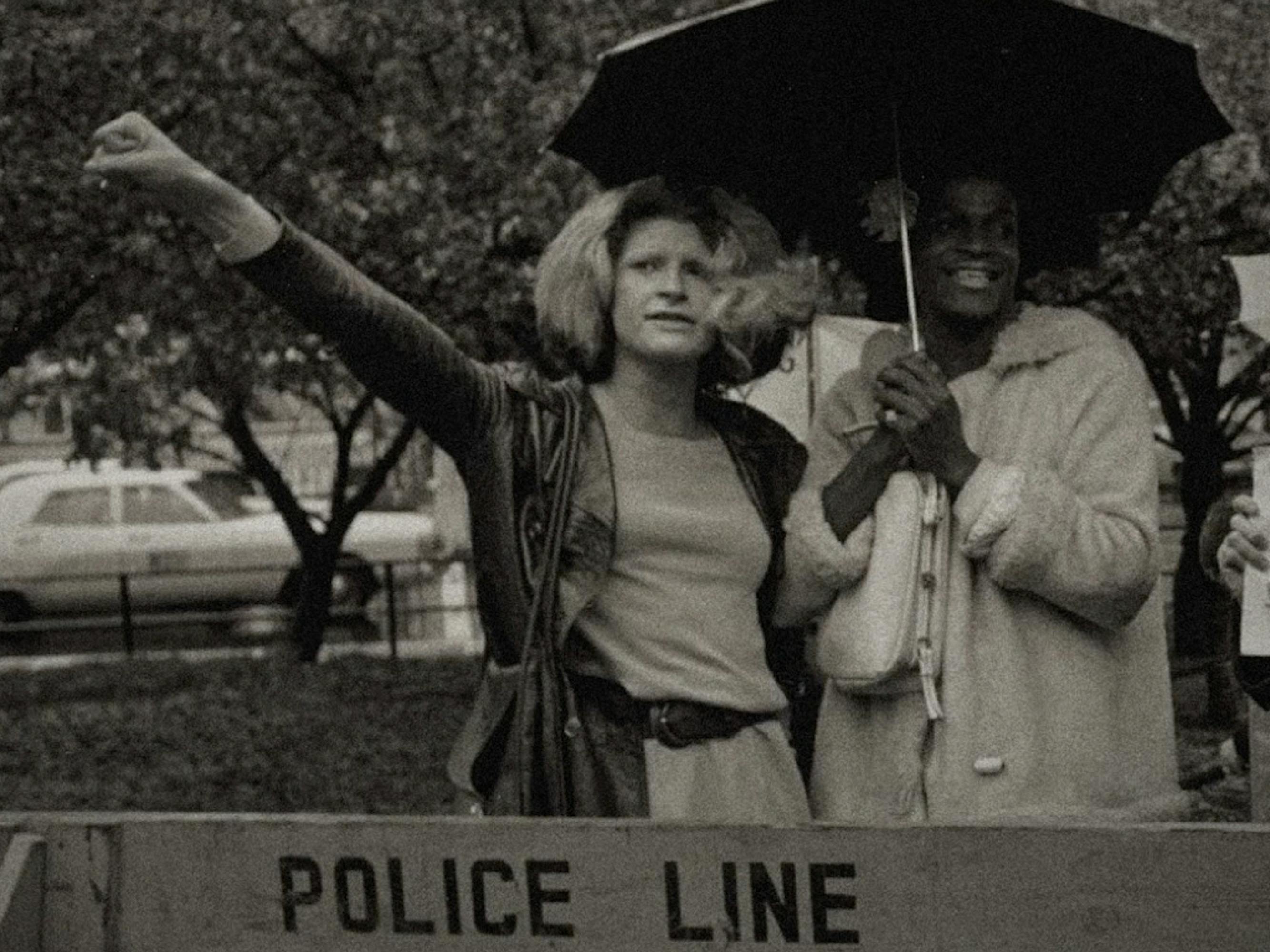 Sylvia Rivera and Marsha P. Johnson stand at the front lines of a protest in New York City, 1973