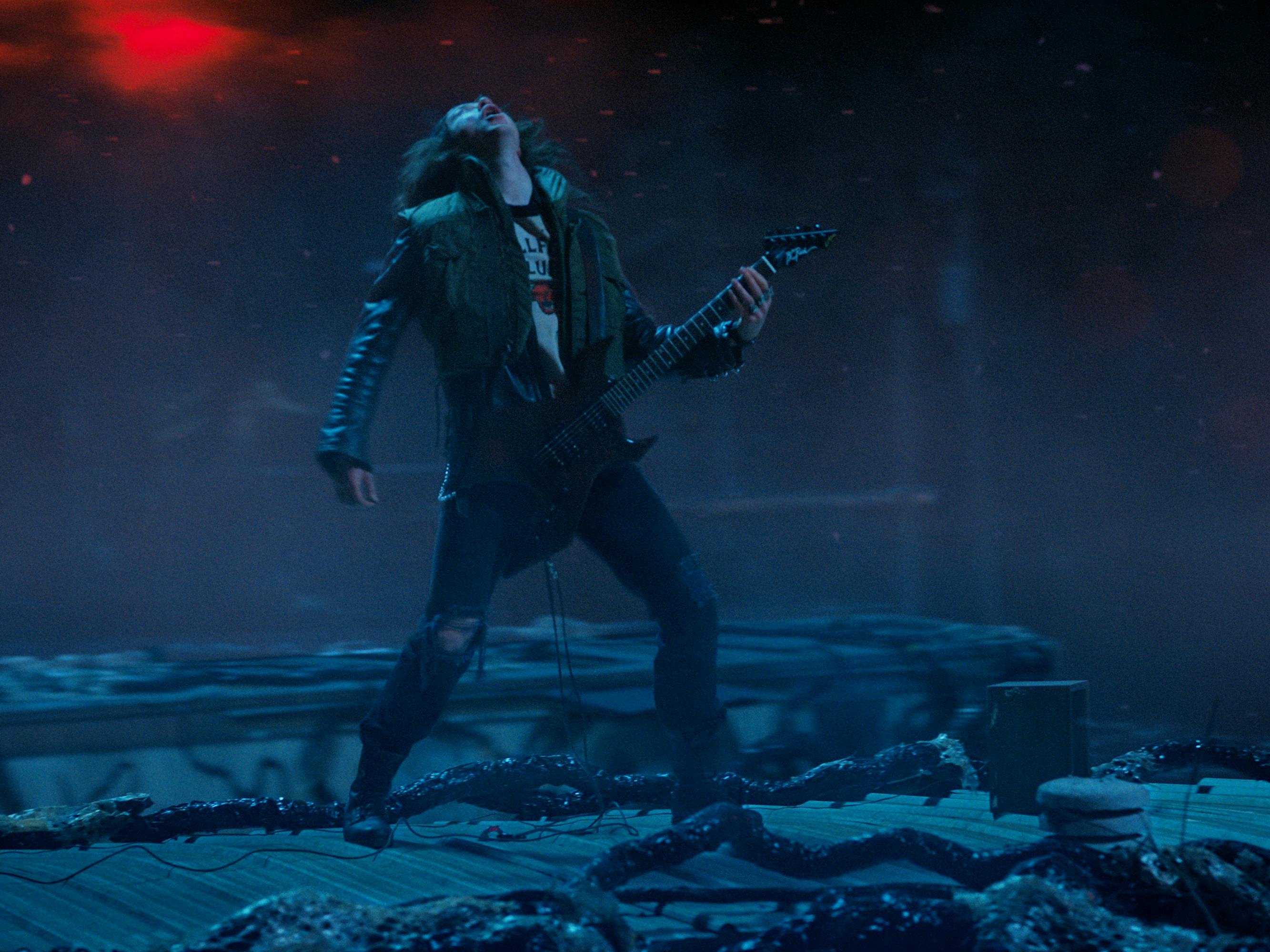 Eddie Munson (Joseph Quinn) plays "Master of Puppets" in Stranger Things 4.