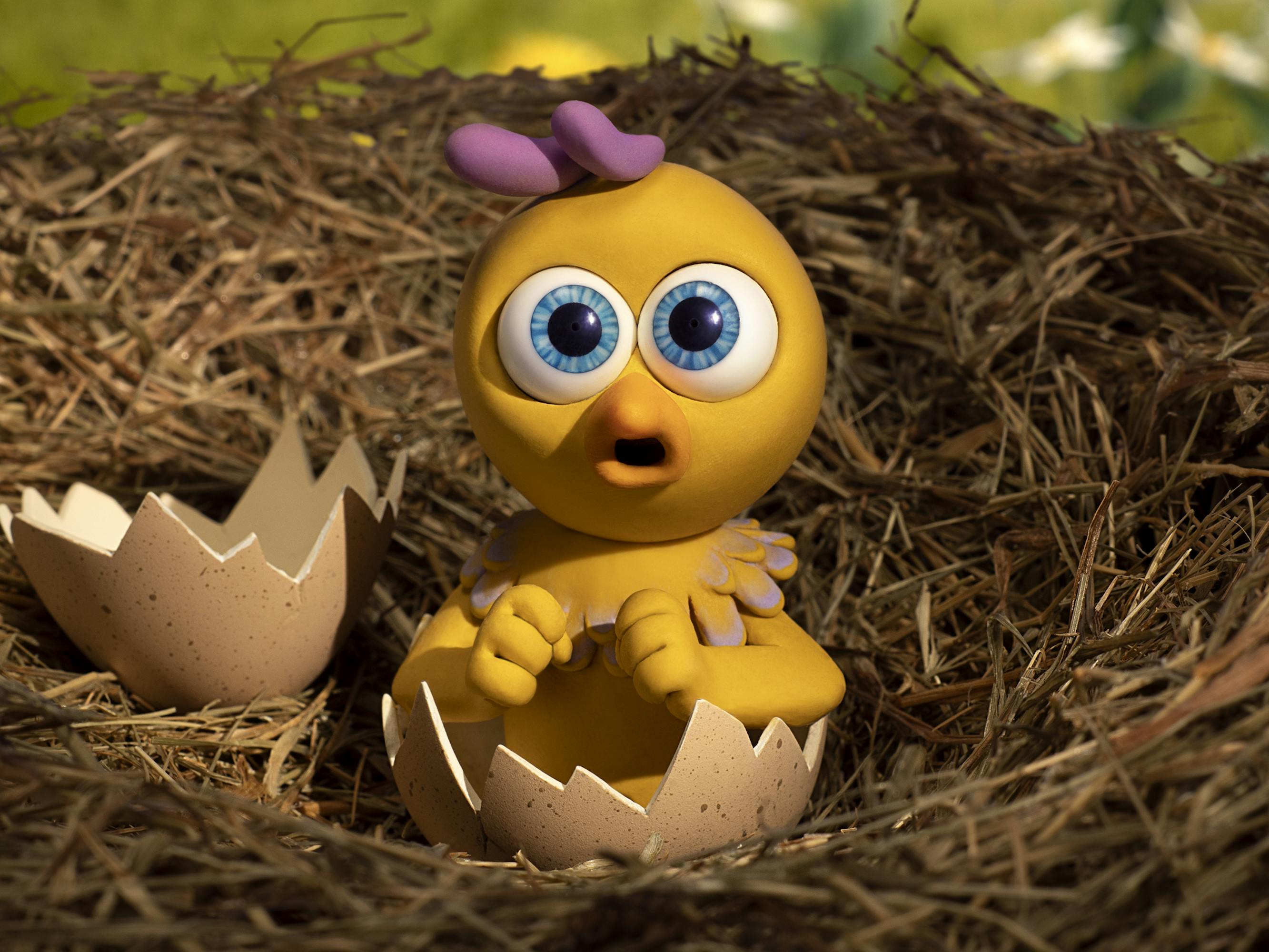Molly (Bella Ramsey) comes out of an egg in a little nest.