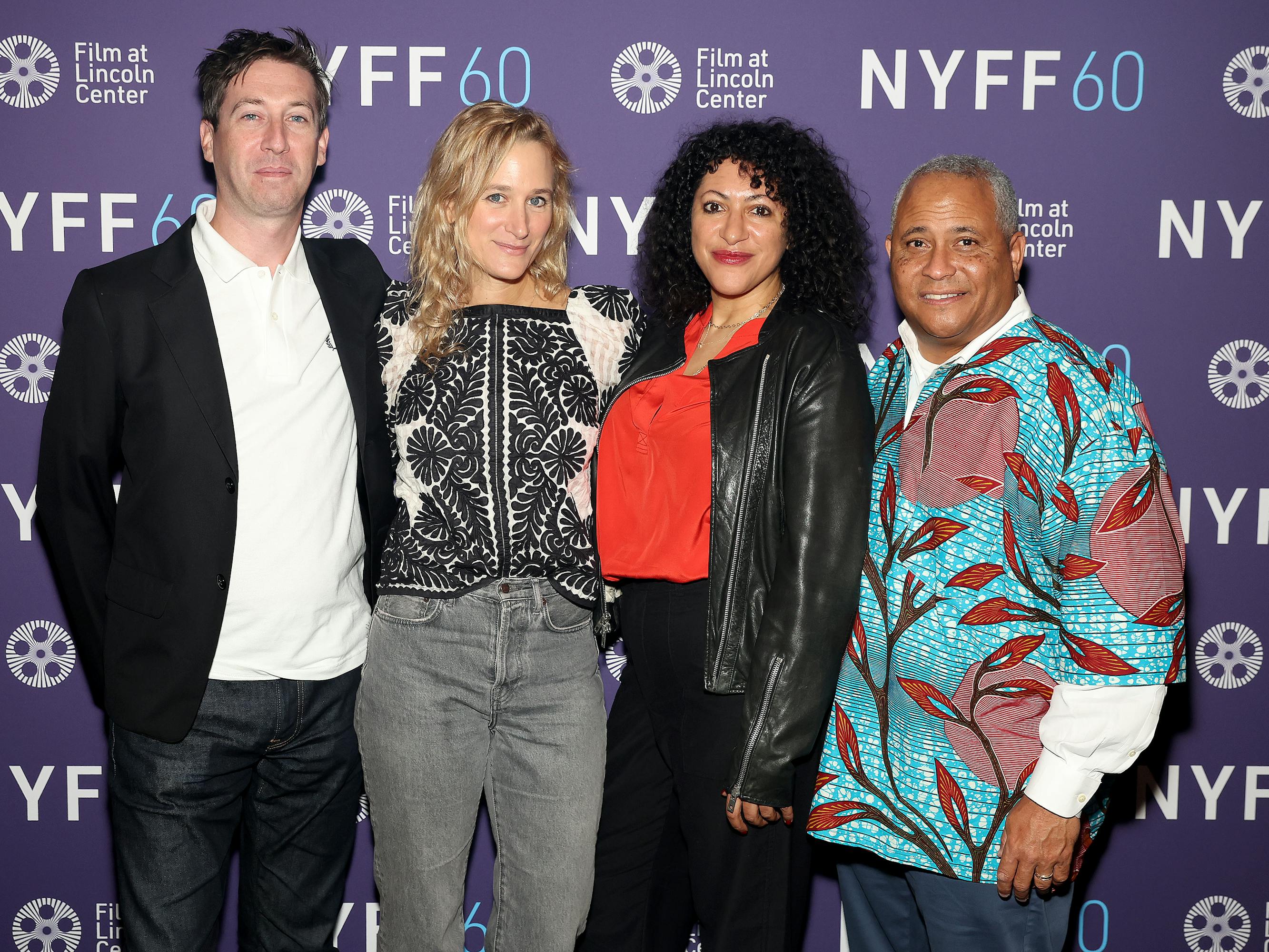 Kyle Martin, Margaret Brown, Essie Chambers, and Dr. Kern Jackson pose together against a purple NYFF step-and-repeat.