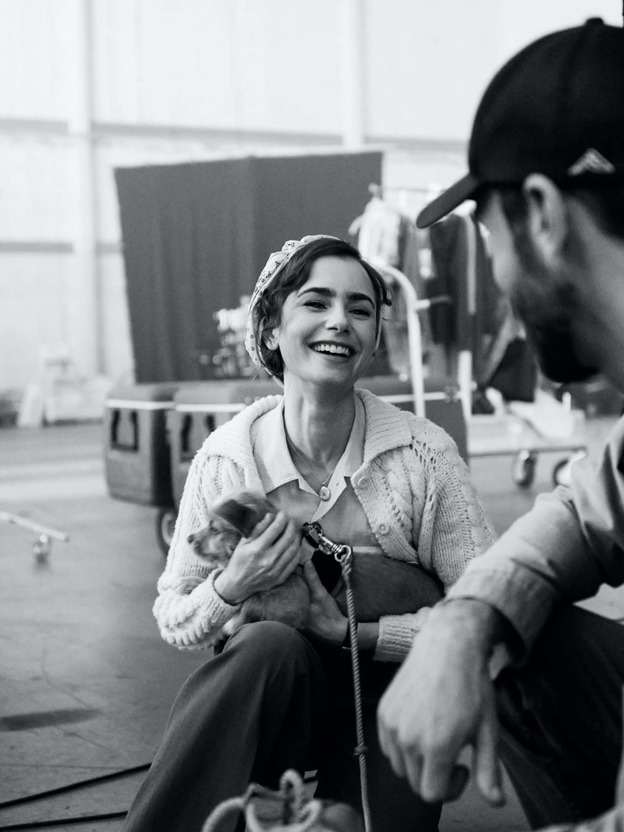 Lily Collins looking straight out of 1930s Hollywood between scenes.