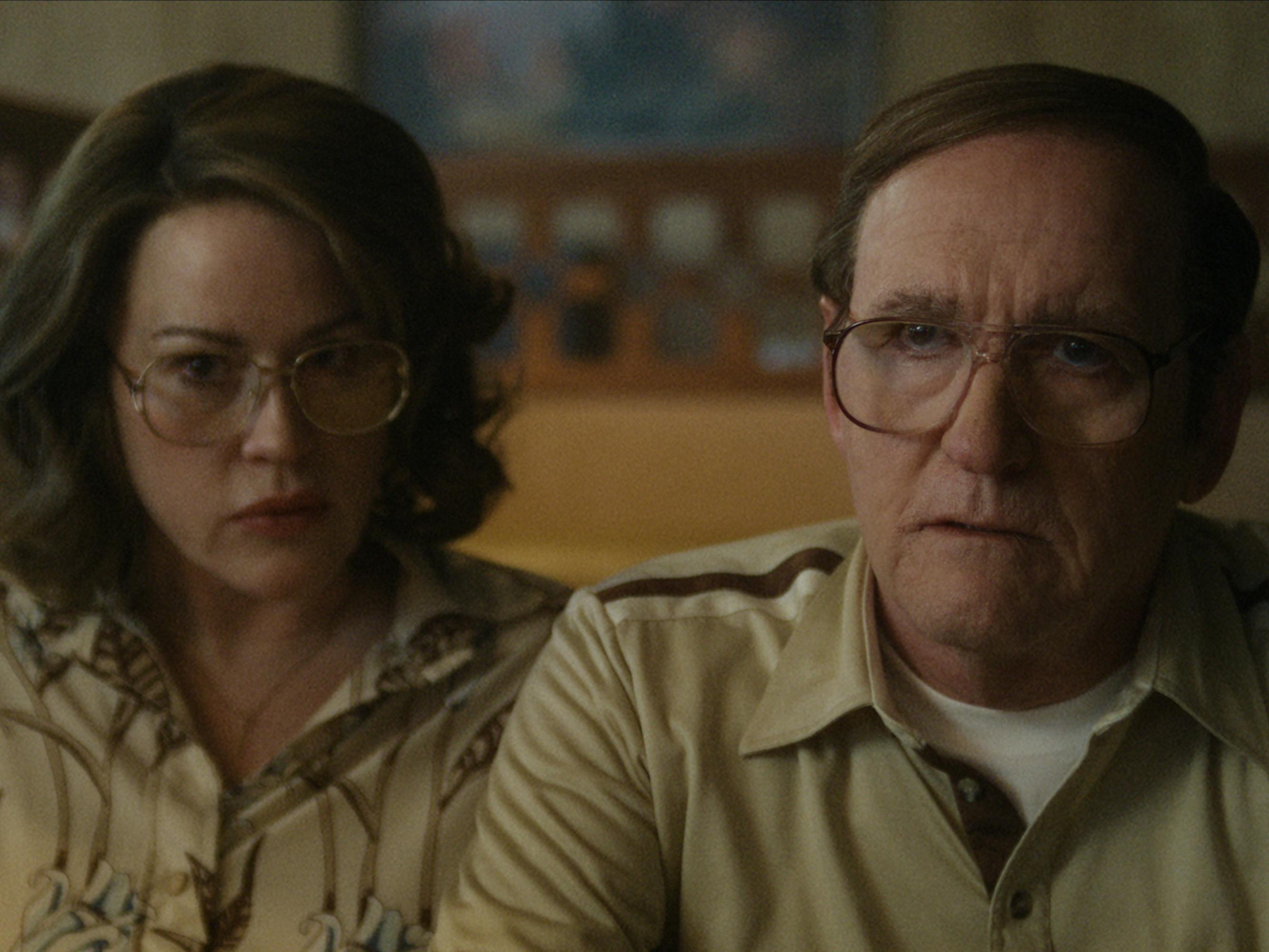 Shari (Molly Ringwald) and Lionel Dahmer (Richard Jenkins) sit together wearing various shades of khaki.