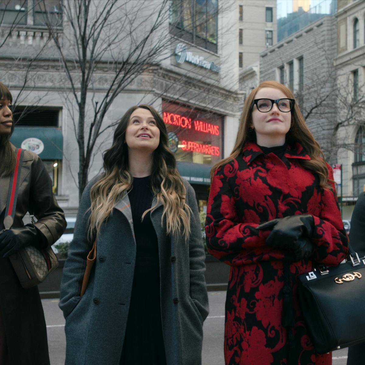 Kacy Duke (Laverne Cox), Rachel Williams (Katie Lowes), Anna Delvey (Julia Garner), and Neff (Alexis Floyd) stand in front of Anna's dream building — 281 Park. 