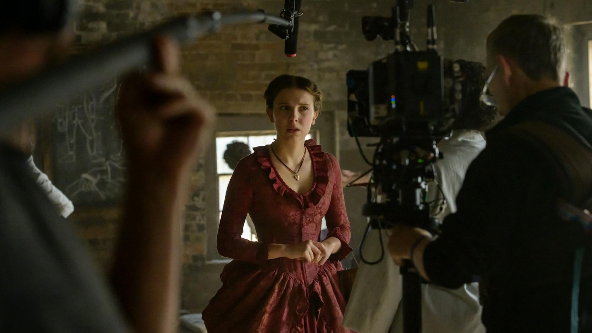 Millie Bobby Brown on the set of *Enola Holmes*.