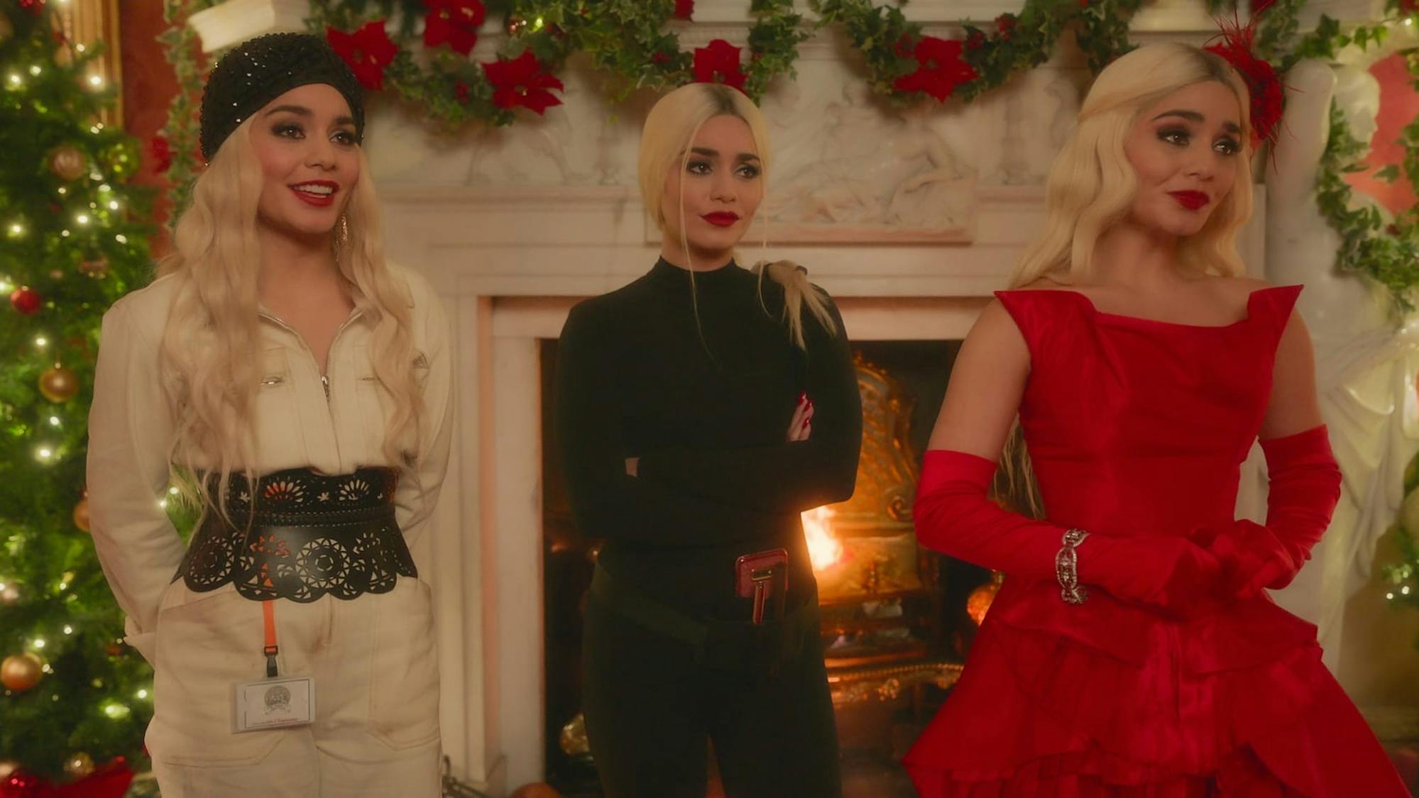 Three identical women stand in front of a fireplace. One wears a white ensemble complete with a black hat, belf, and lanyard, One wears an all black look. One wears a red dress with gloves. All three wear a bold red lip.