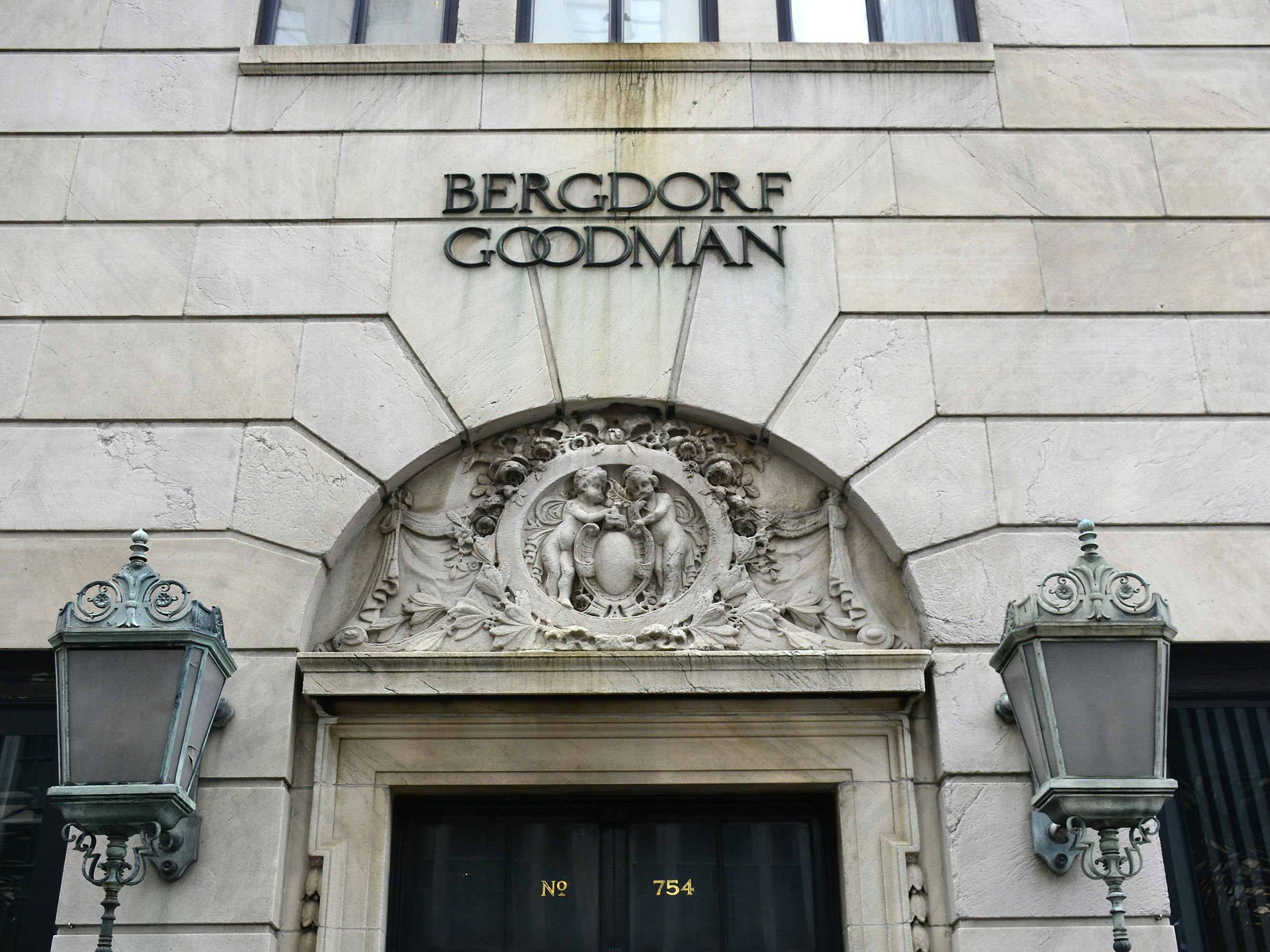 The outside of Bergdorf Goodman. The door is flanked by two large lanterns.