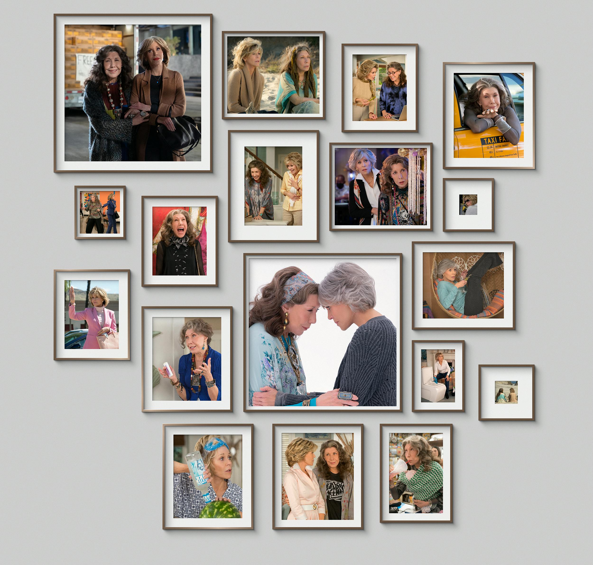 A gray wall with framed images of Grace and Frankie, the most iconic besties! 