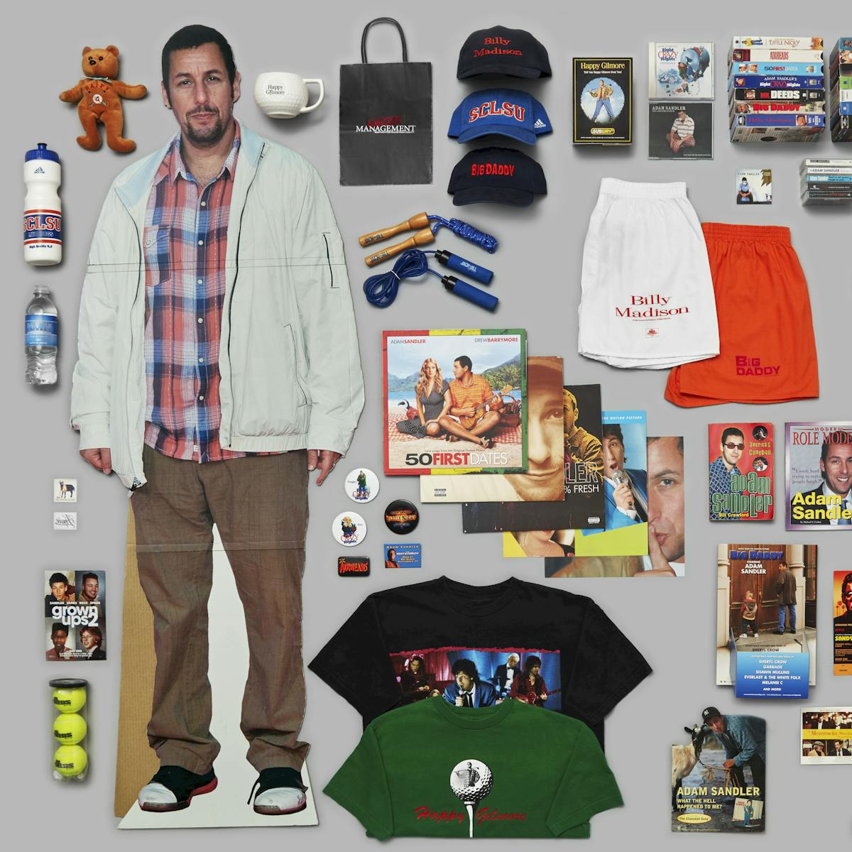 The Adam Sandler starter pack, including long gym shorts, baseball hats, t-shirts, waterbottles, sports balls, and movie posters.  