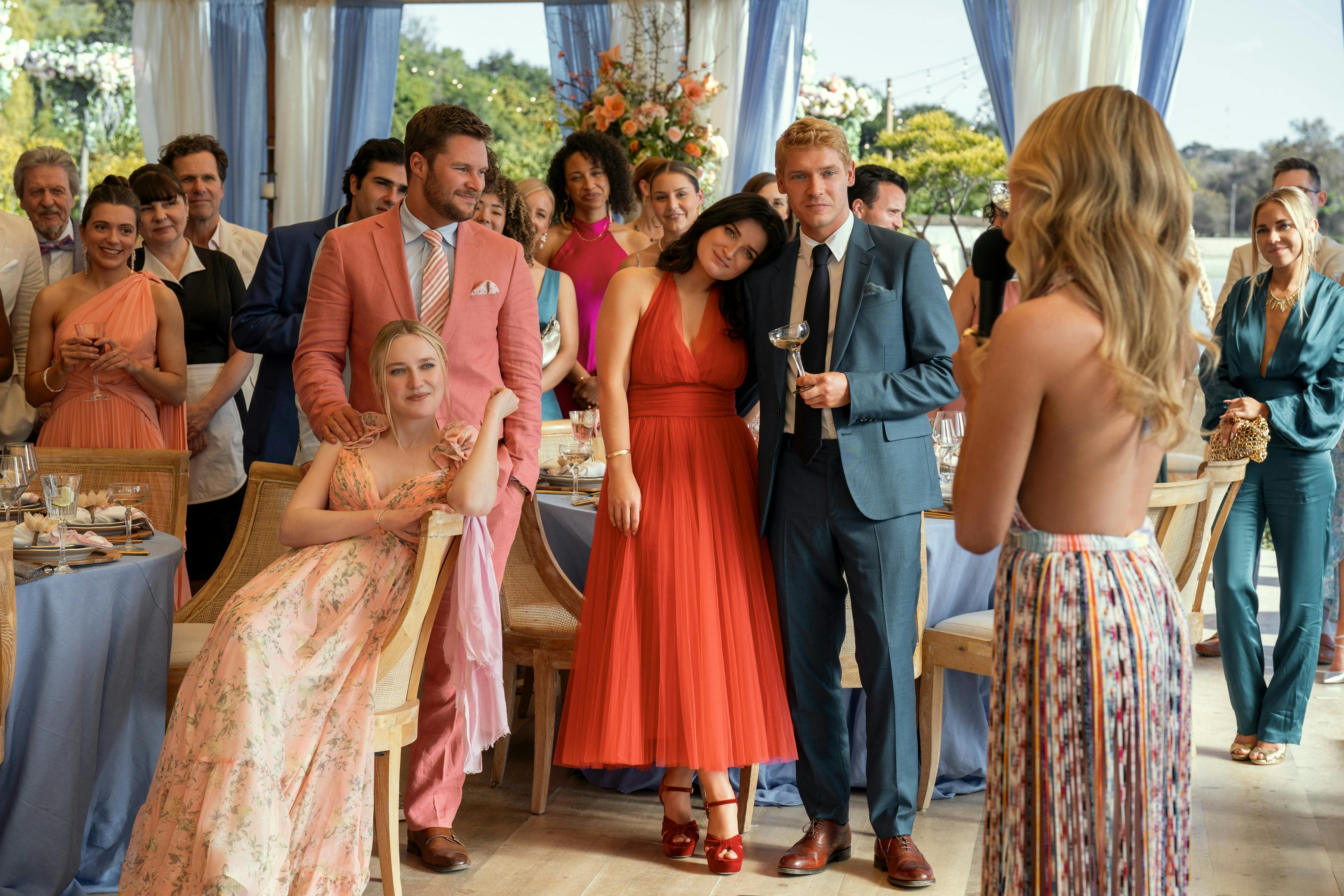 Abby (Dakota Fanning), (Thomas) Jack Reynor, Amelia (Eve Hewson), Benji (Billy Howle), and Merritt (Meghann Fahy) stand around at a rehearsal dinner.