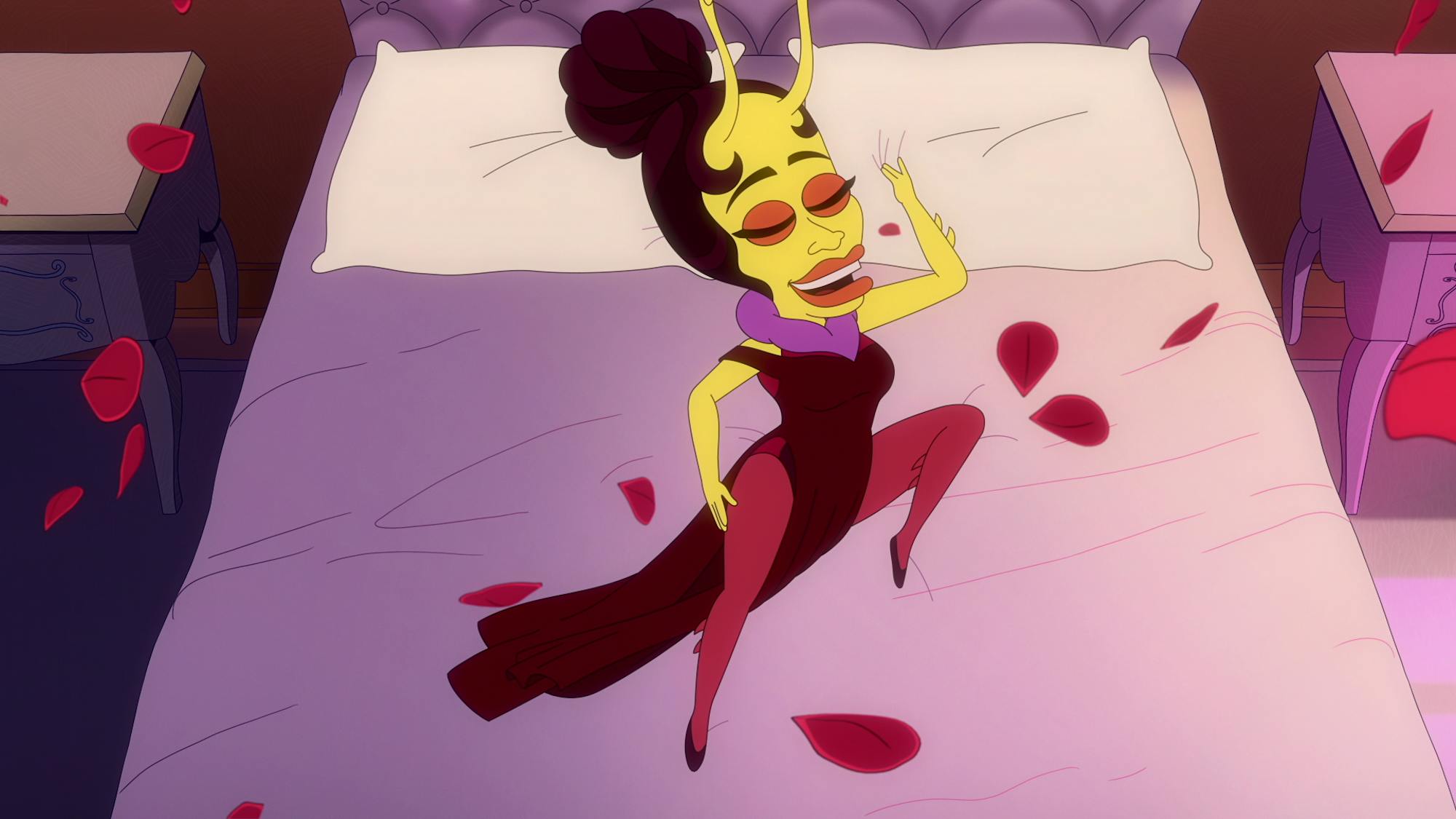 A creature lies in a bed strewn with rose petals. She wears a black dress and purple cravat.