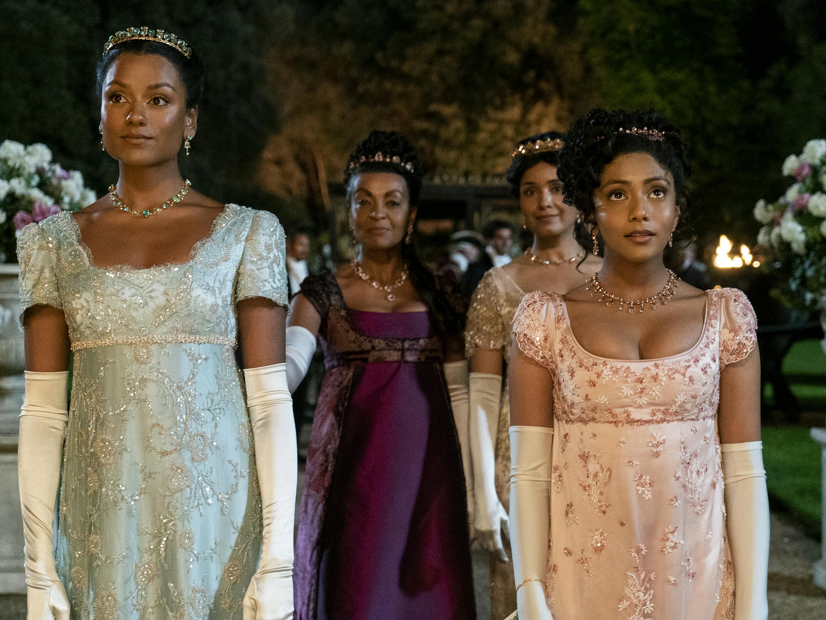 Kate Sharma (Simone Ashley), Lady Danbury (Adjoa Andoh), Mary Sharma (Shelley Conn), and Edwina Sharma (Charithra Chandran) wear their best for the ball.