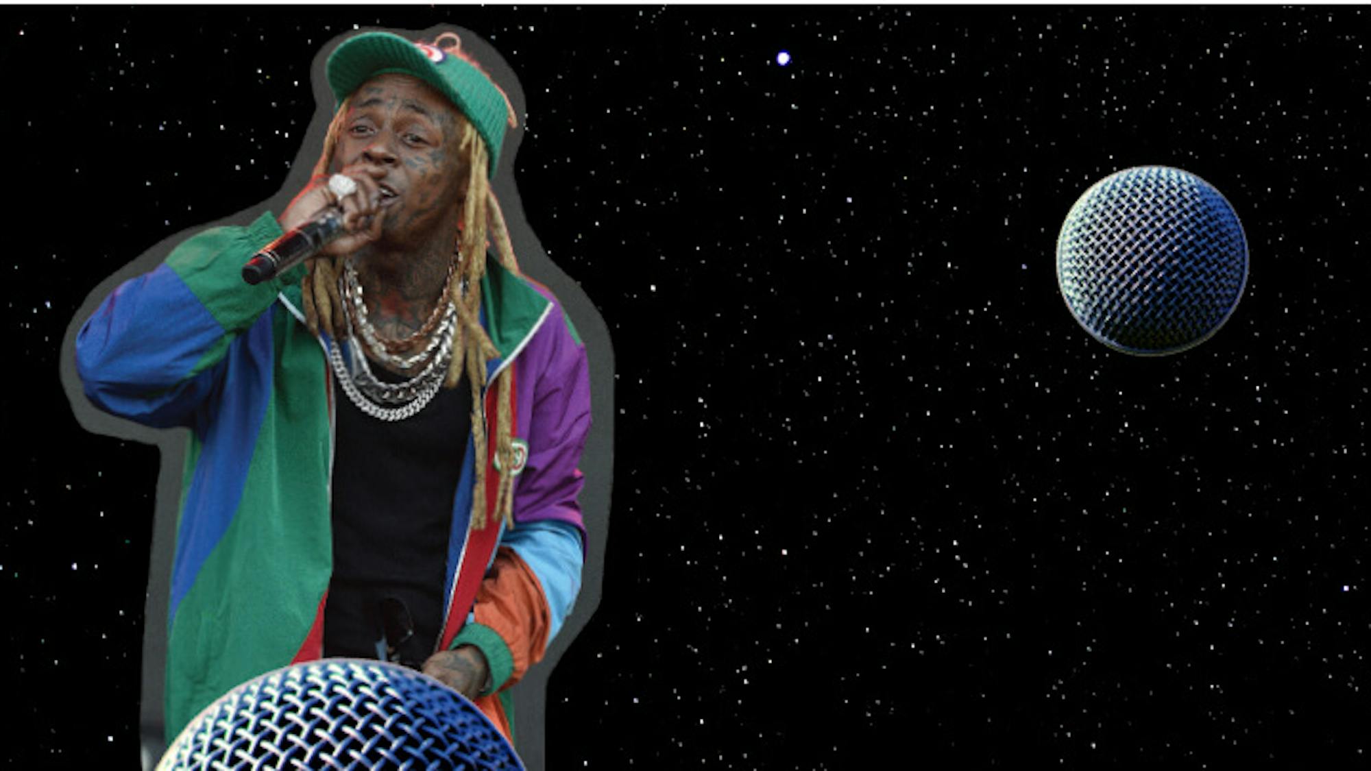 Lil Wayne sings in a mic, dripping with necklaces and wearing a multi-colored jacket and matching hat.