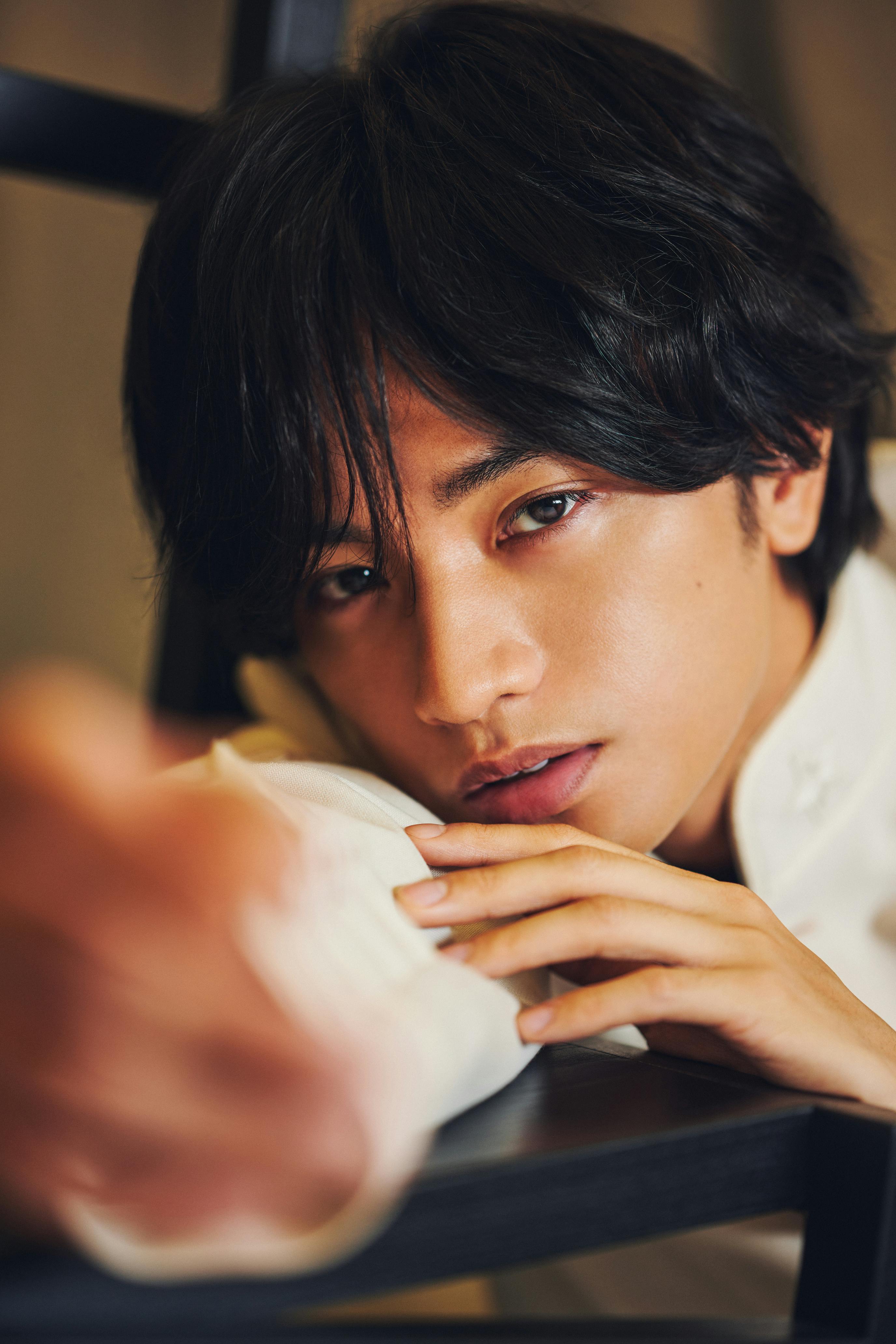 Kento Nakajima looks directly at the camera in this sunlit shot.