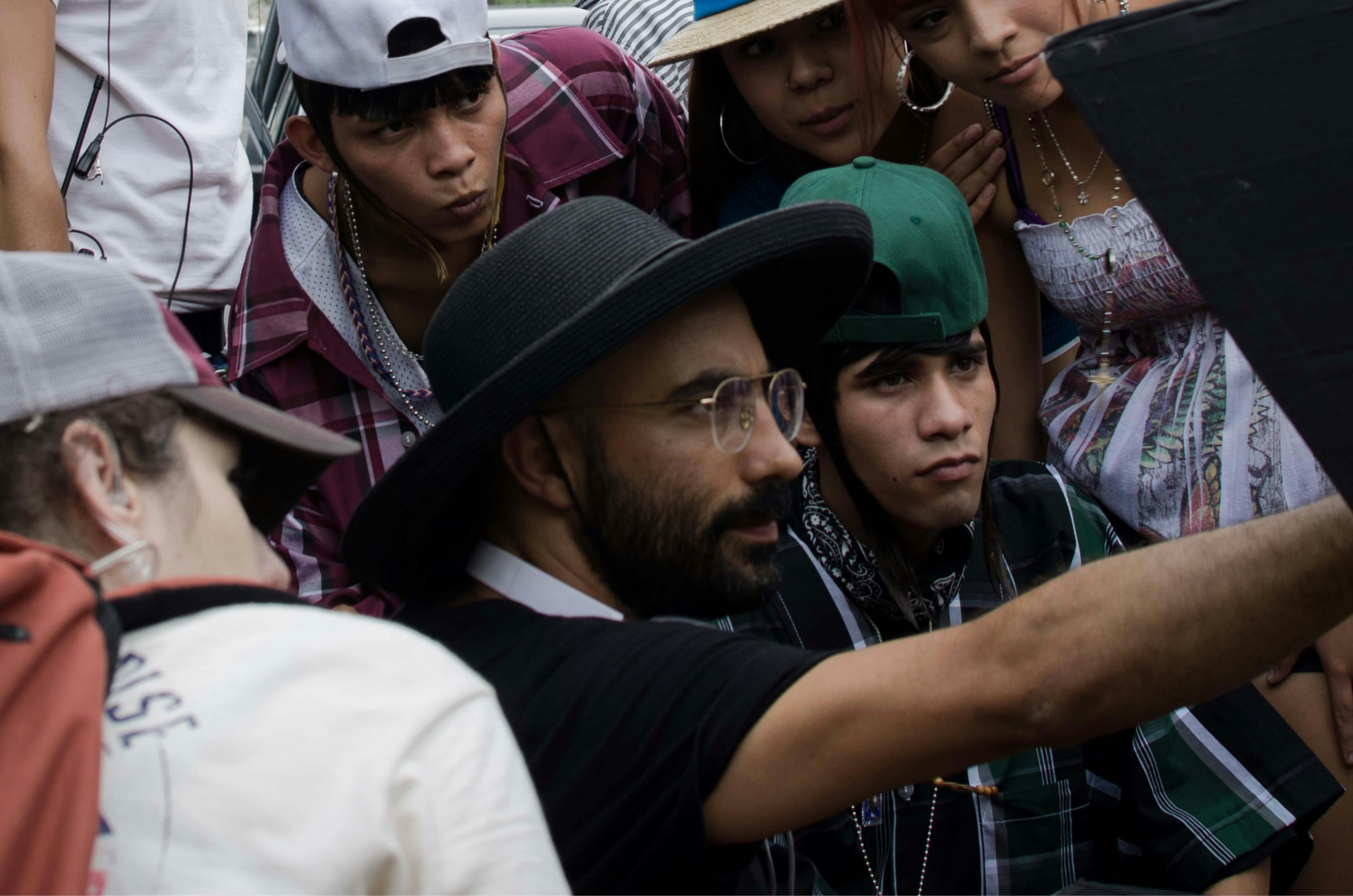 Fernando Frías de la Parra reviews footage with the cast of <i>Ya no Estoy Aquí.</i>