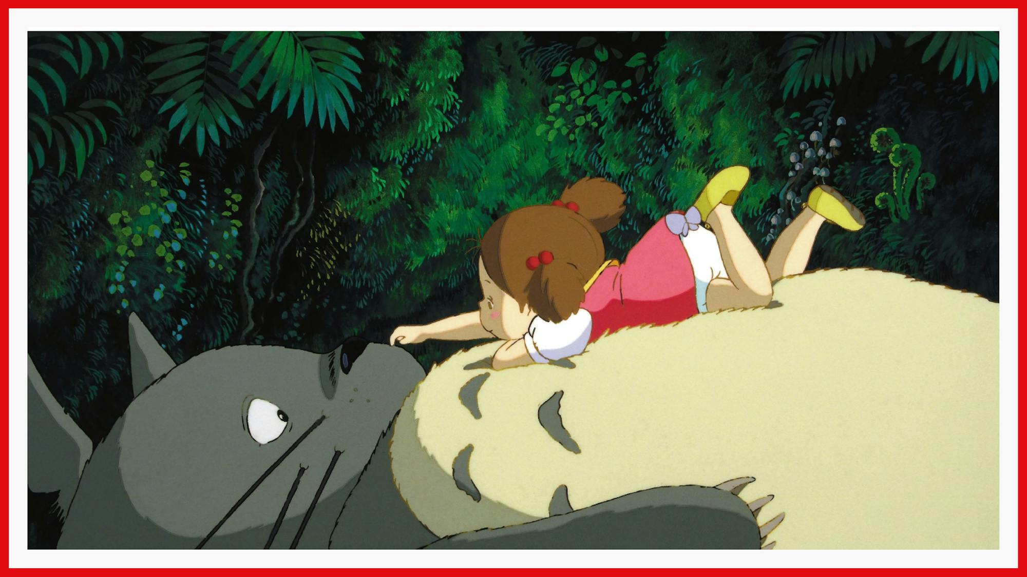 Mei lounges on Totoro’s belly, scratching his nose.