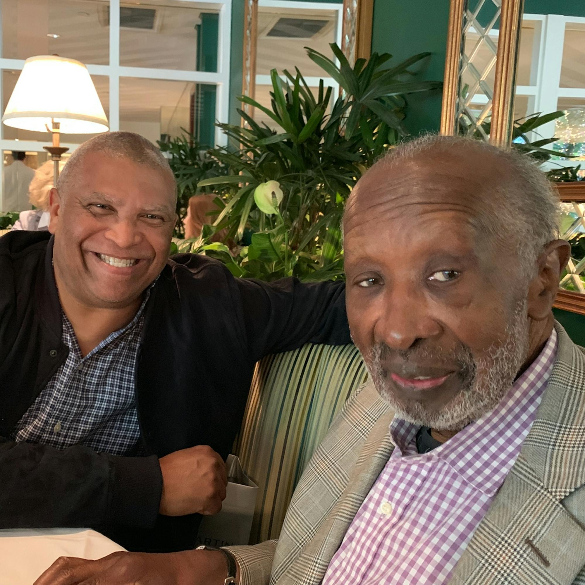 Reginald Hudlin with “The Black Godfather” Clarence Avant