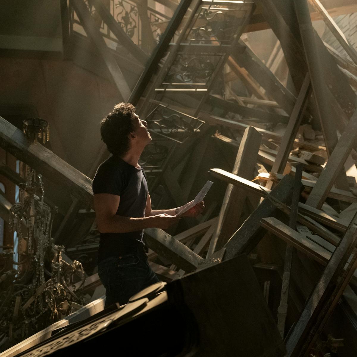 Shawn Levy makes his way through some wooden rubble.