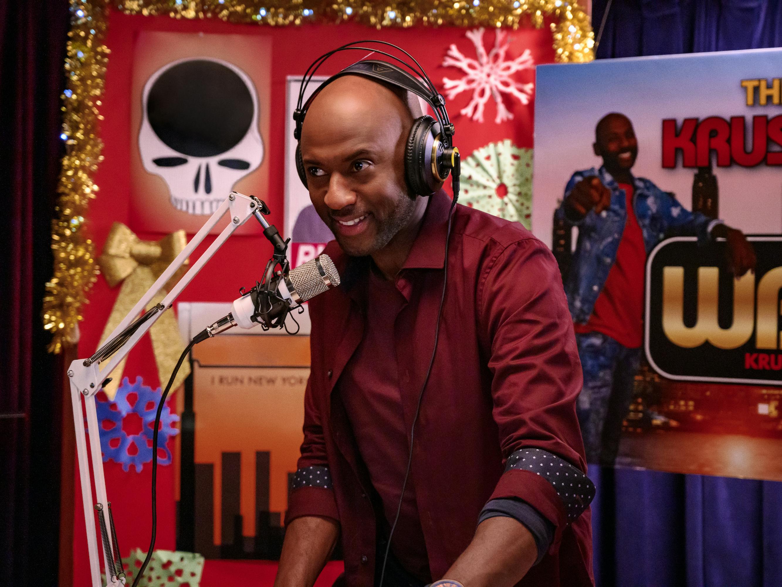 Rush (Romany Malco) works the DJ booth.