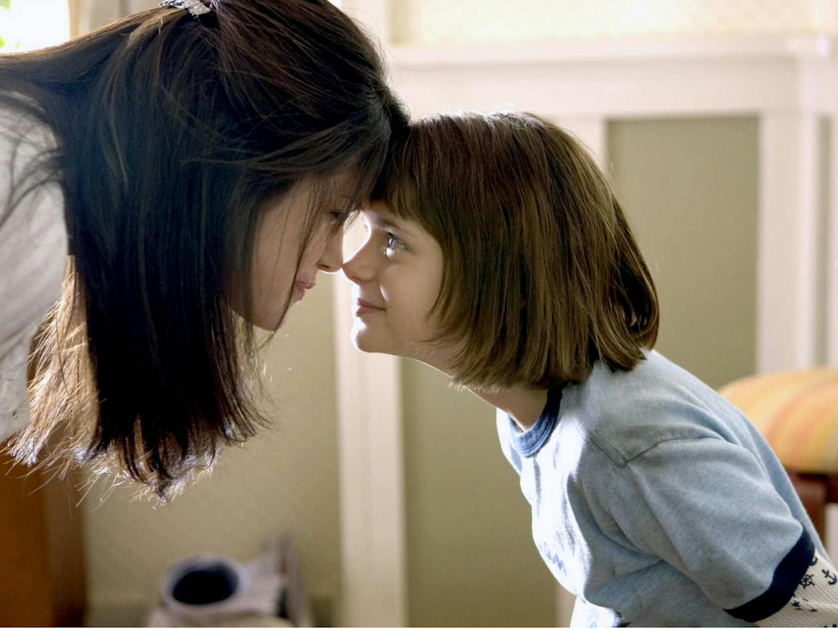 Beezus Quimby (Selena Gomez) and Ramona Quimby (Joey King) in Ramona and Beezus (2010). They go head to head, with their foreheads pressed against each other.