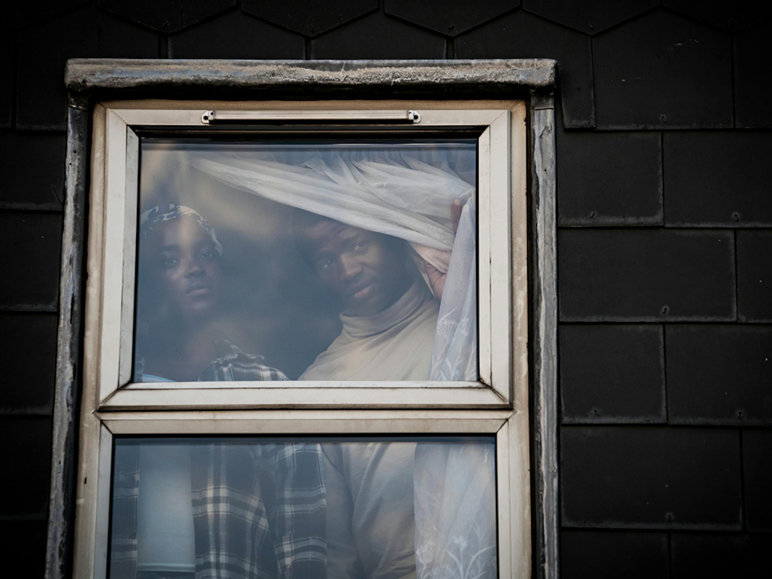 Wunmi Mosaku and Sope Dirisu as Rial and Bol 