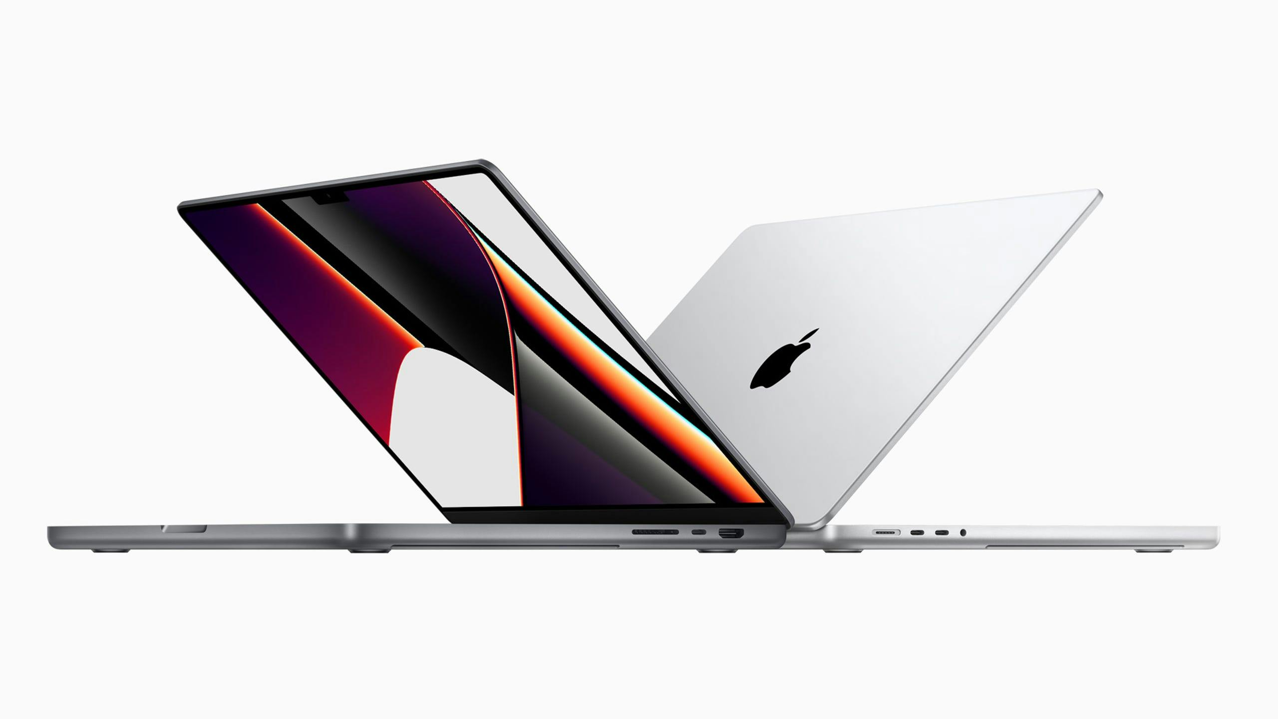 An image of two Apple MacBook Pros in space gray and silver.