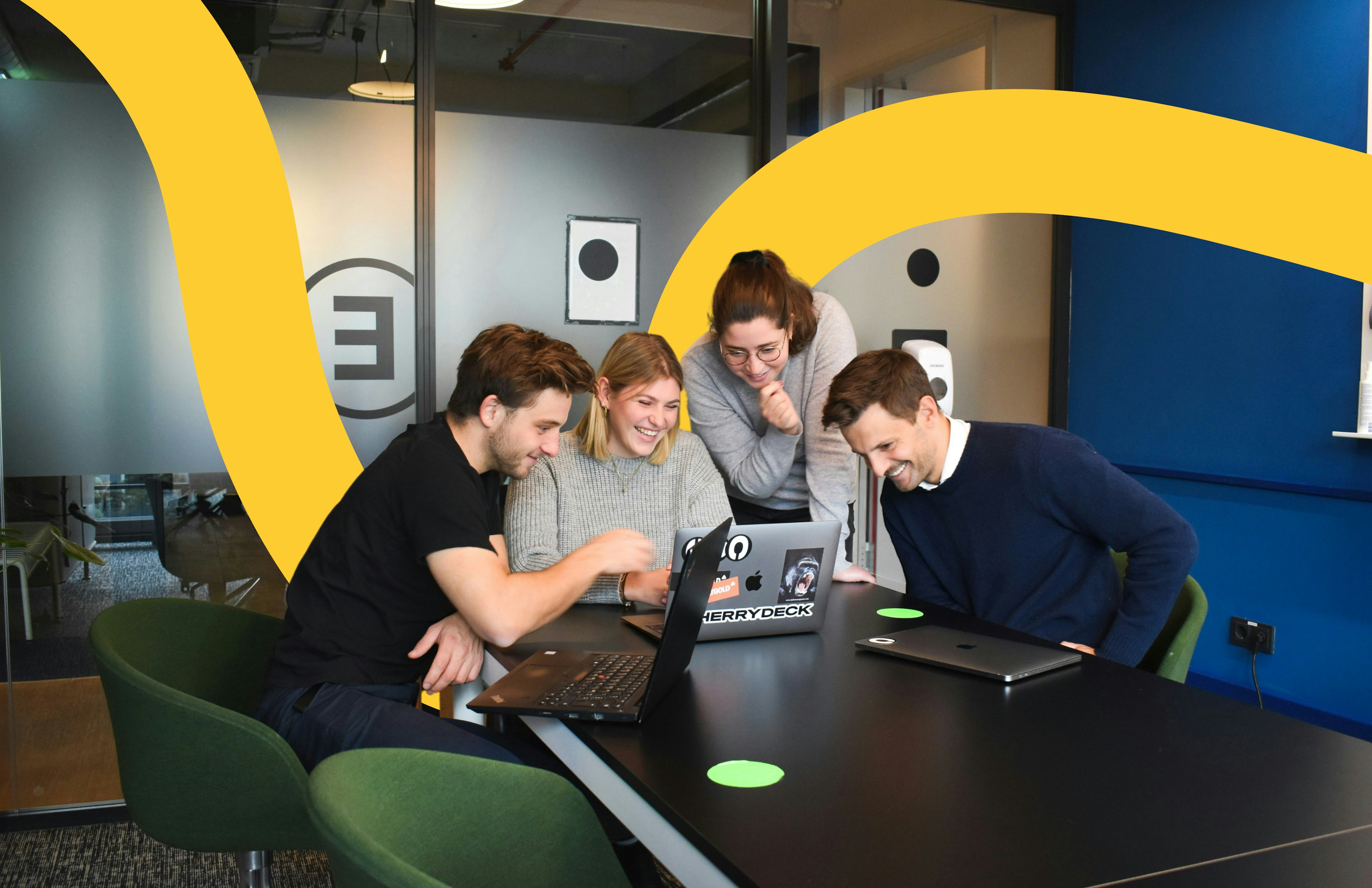 IT support team looking at MAcbook computer