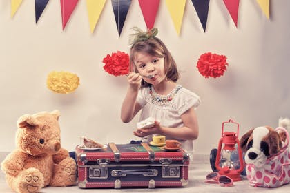 Child having a teddy bears picnic