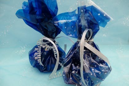 Cellophane Frozen party bags with silver ribbon and icicle decorations