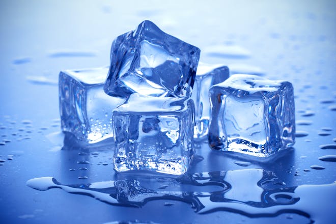 cubes of ice on blue background
