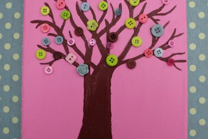 Tree picture craft with buttons glued on for the leaves