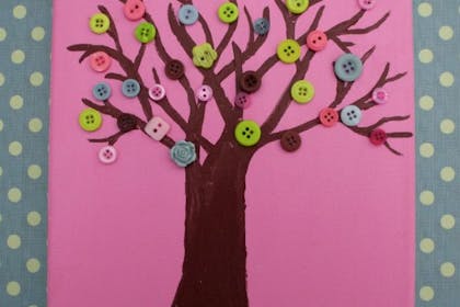 Tree picture craft with buttons glued on for the leaves