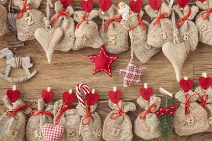 Homemade advent calendar with hanging hessian sacks