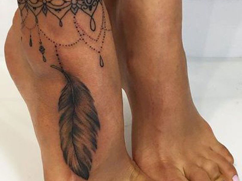 a foot feather tattooTikTok Search