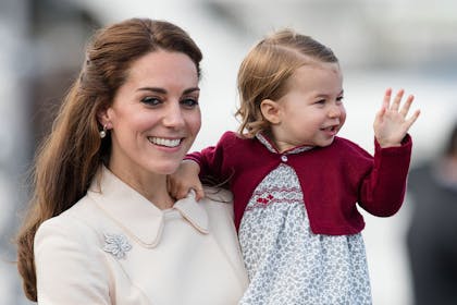 Kate Middleton and Princess Charlotte waving