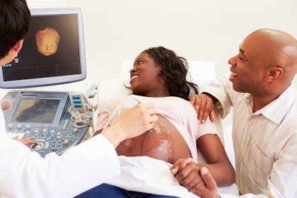 pregnant woman in hospital having 4D pregnancy scan 