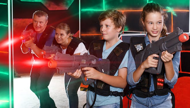 Family playing laser tag