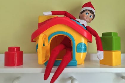 elf in toy house