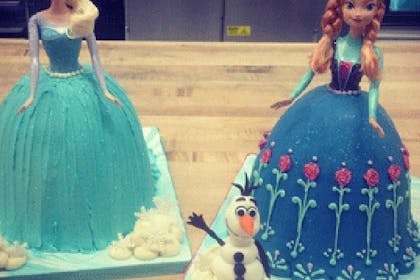 Anna and Elsa dress cakes, with a model Olaf, for Frozen birthday party