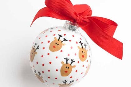 Christmas bauble decorated with fingerprint painting