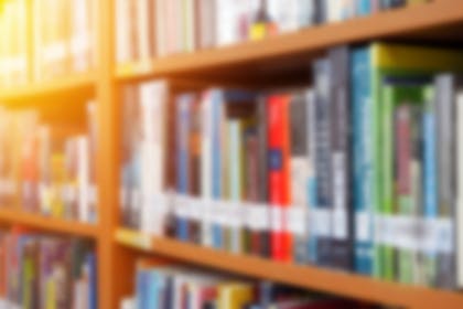 Books on a bookcase in library