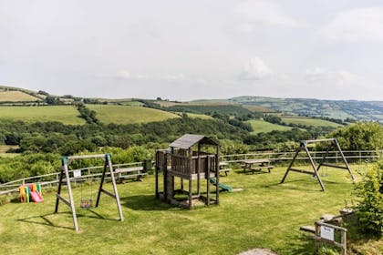 Playground and hills at Treberfedd Farm