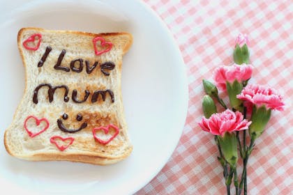 toast with writing on it and pink flowers